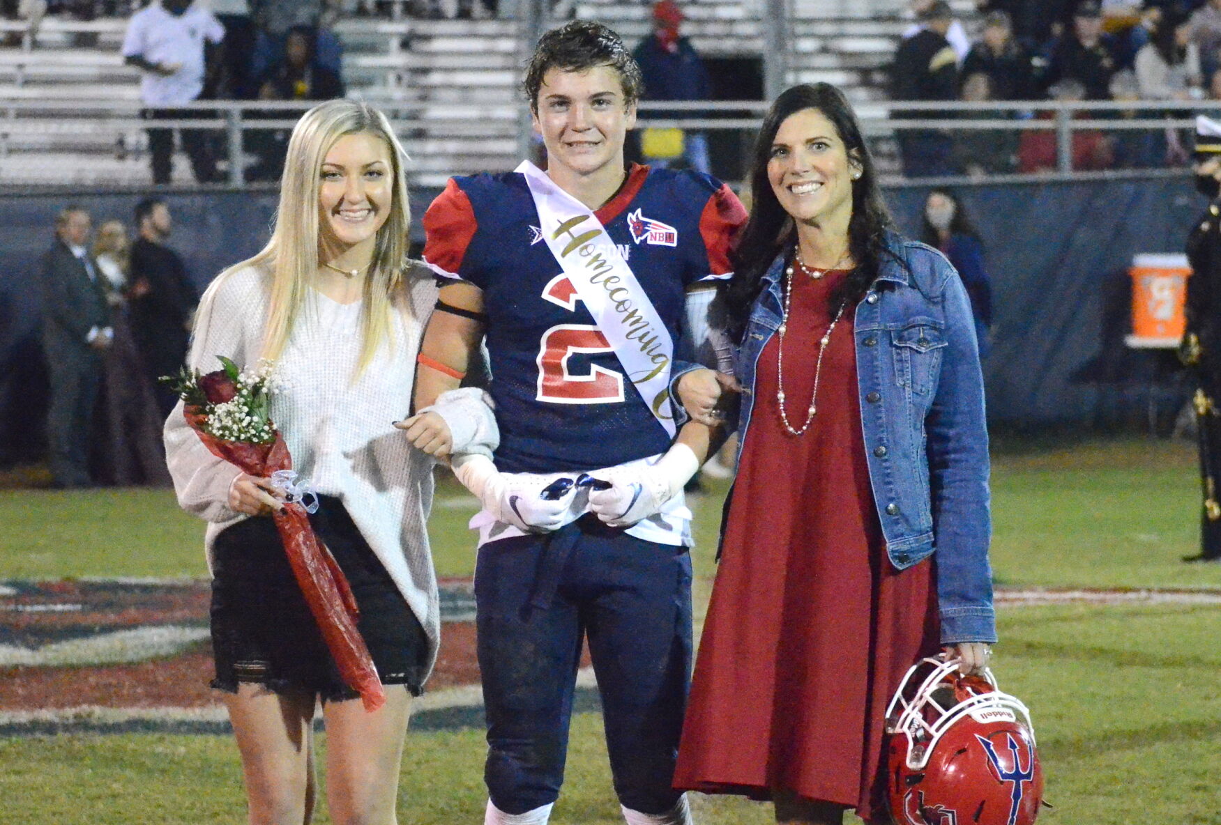 Gavin Glass, escorted by his mother Katie Pirkle and girlfriend Mallory Britton.jpg